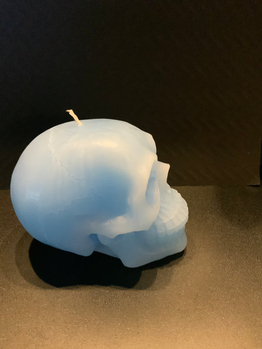 Blue human skull candle