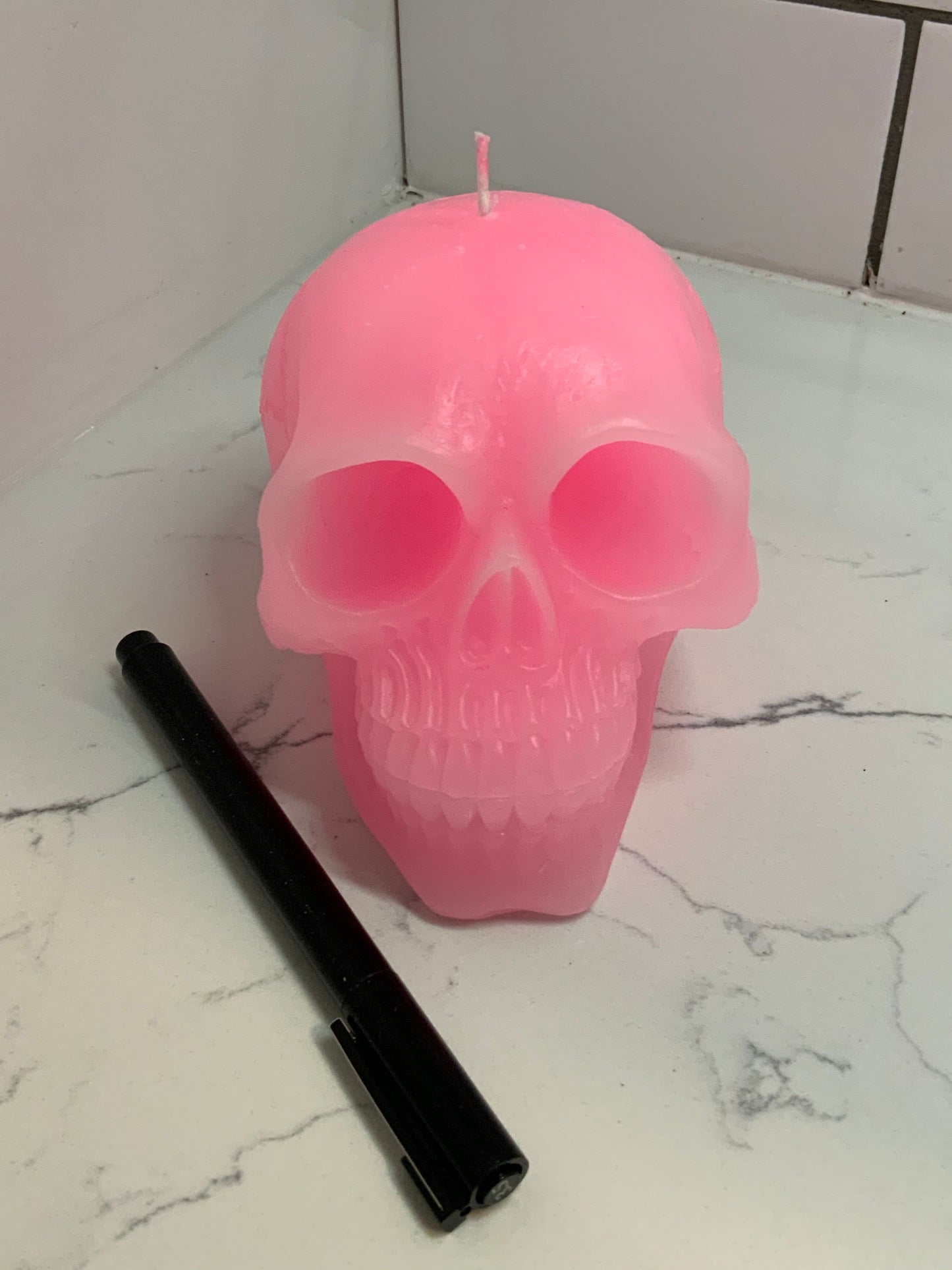 Pink skull candle