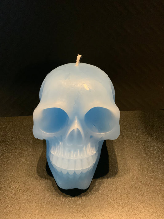 Blue human skull candle